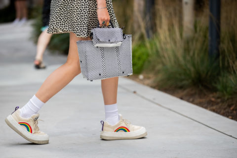 converse style sneakers with a rainbow inspo for what to wear to pride 2022