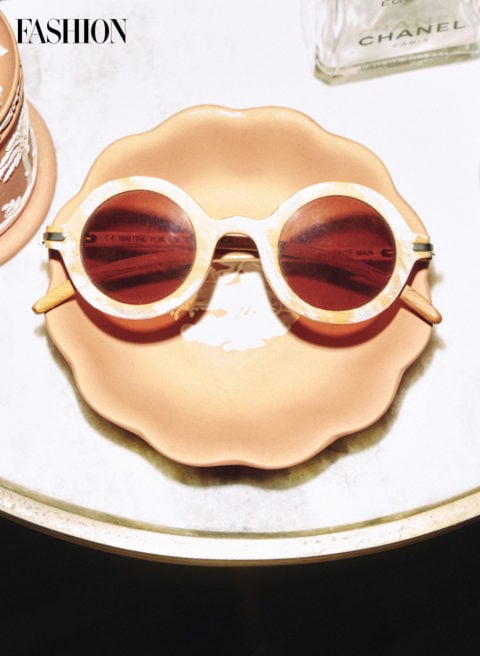 glasses collection: white tortoiseshell sunglasses on a saucer